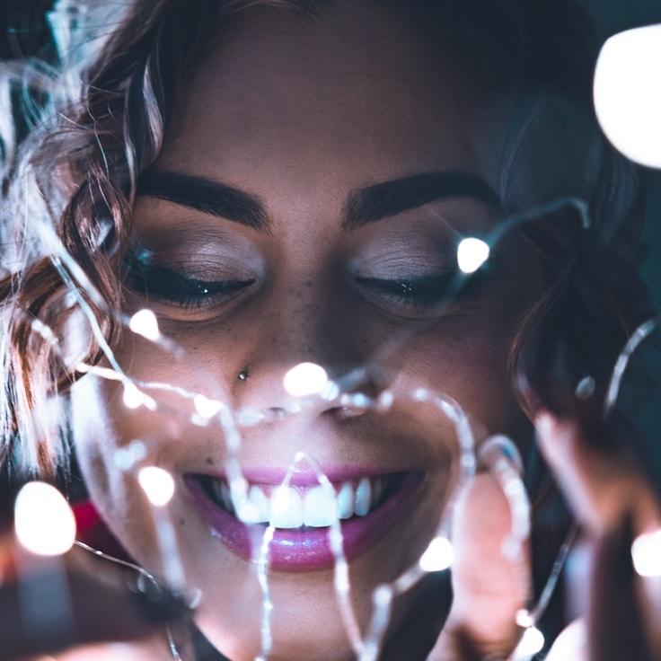 Avery Chen, Lead Design Curator at VistaGraniteQuiet, reviewing corporate floral arrangements